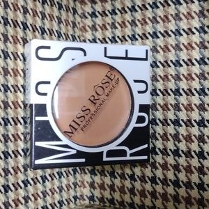 Powder Concealer, by Miss Rose. Medium brown color.